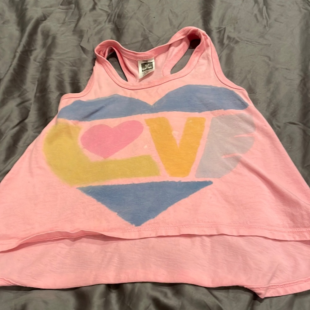 Tank top stains in picture I think are meant to be there